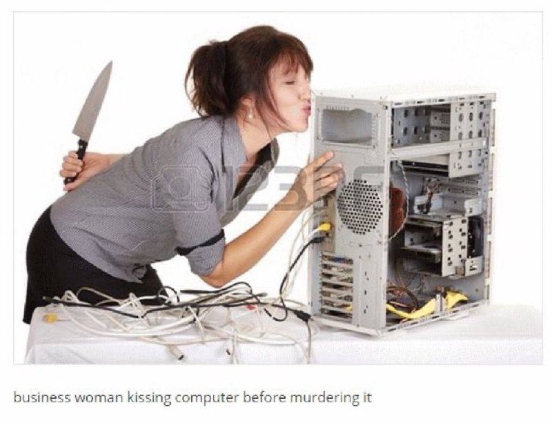 business woman kissing computer before murdering it
