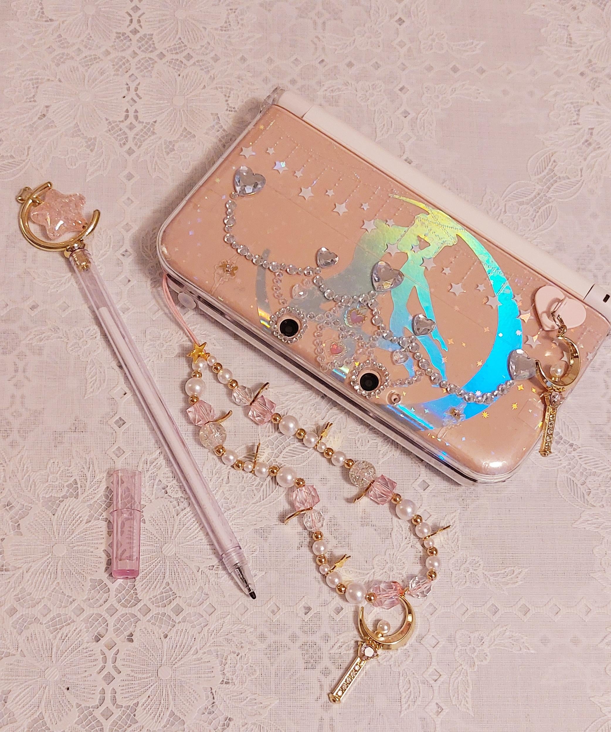 submitted 12 hours ago by Accomplished_Mail_41

Showing off my pink 3ds XL. I tried to decorate it in a Sailor moon style and I might have gone too far with it😭
But i love her nonetheless! what do you guys think of it?🩷✨️
(Had to reupload this post cause I posted it on a wrong day)